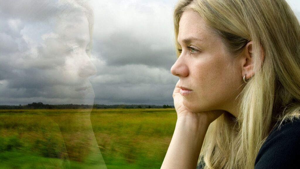 woman reflecting on childhood food anxiety and binge eating